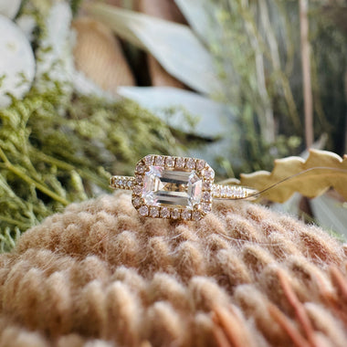 White Topaz and Diamond Halo East/West Ring